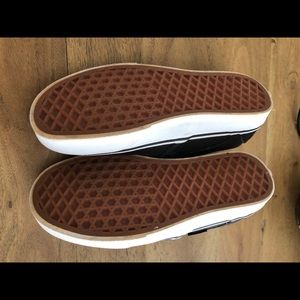 Vans black leather.